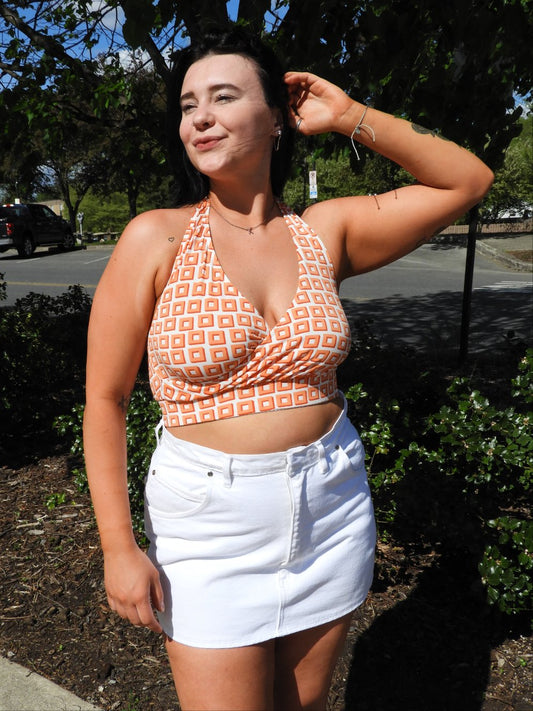 White denim mini skirt. Made out of recycled denim.